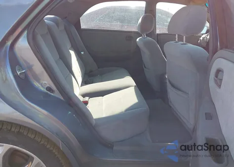 1998 Mazda 626 Dx/Lx z USA, uszkodzony, nr VIN 1YVGF22C6W5698314